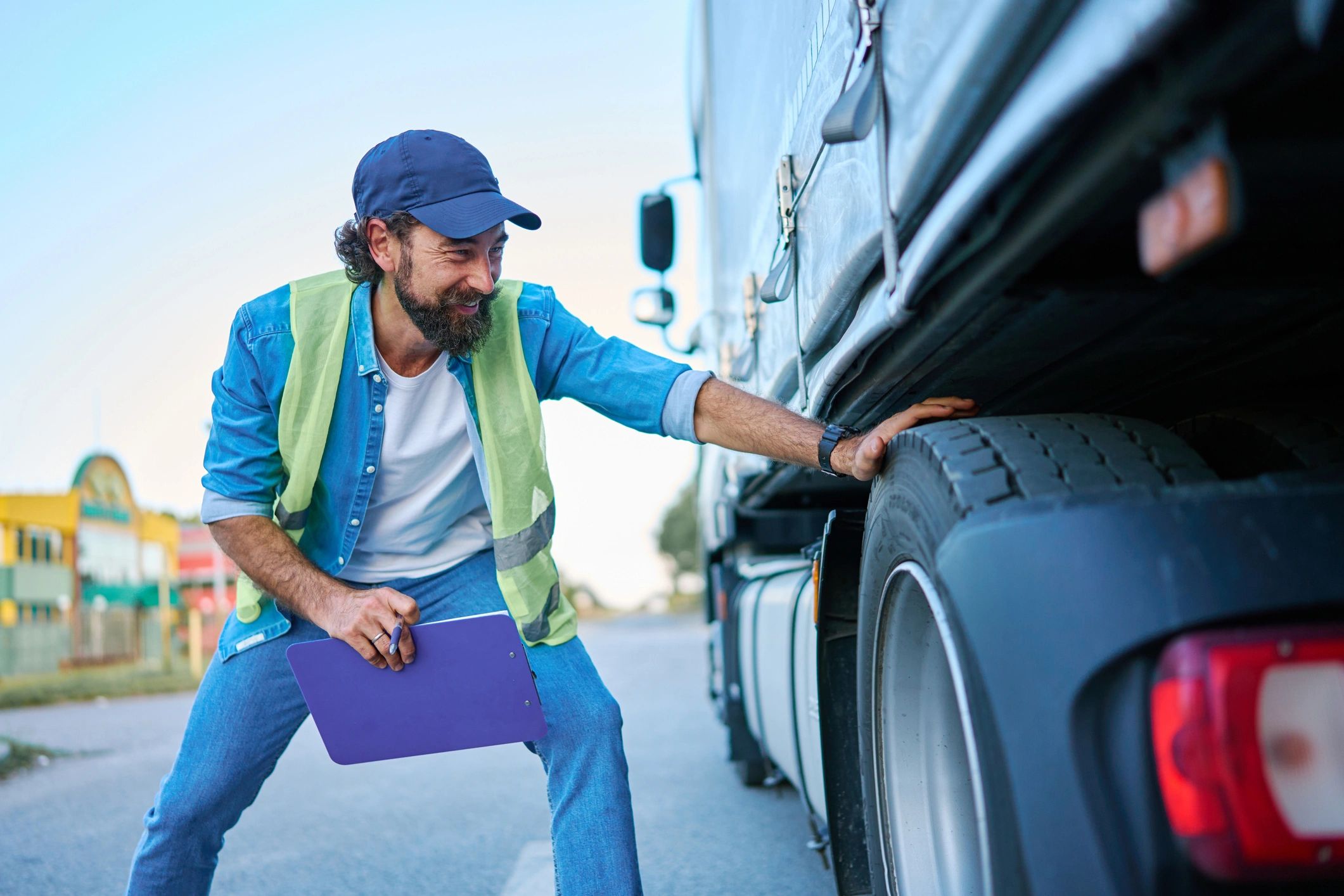 Driver performing a pre-trip inspection